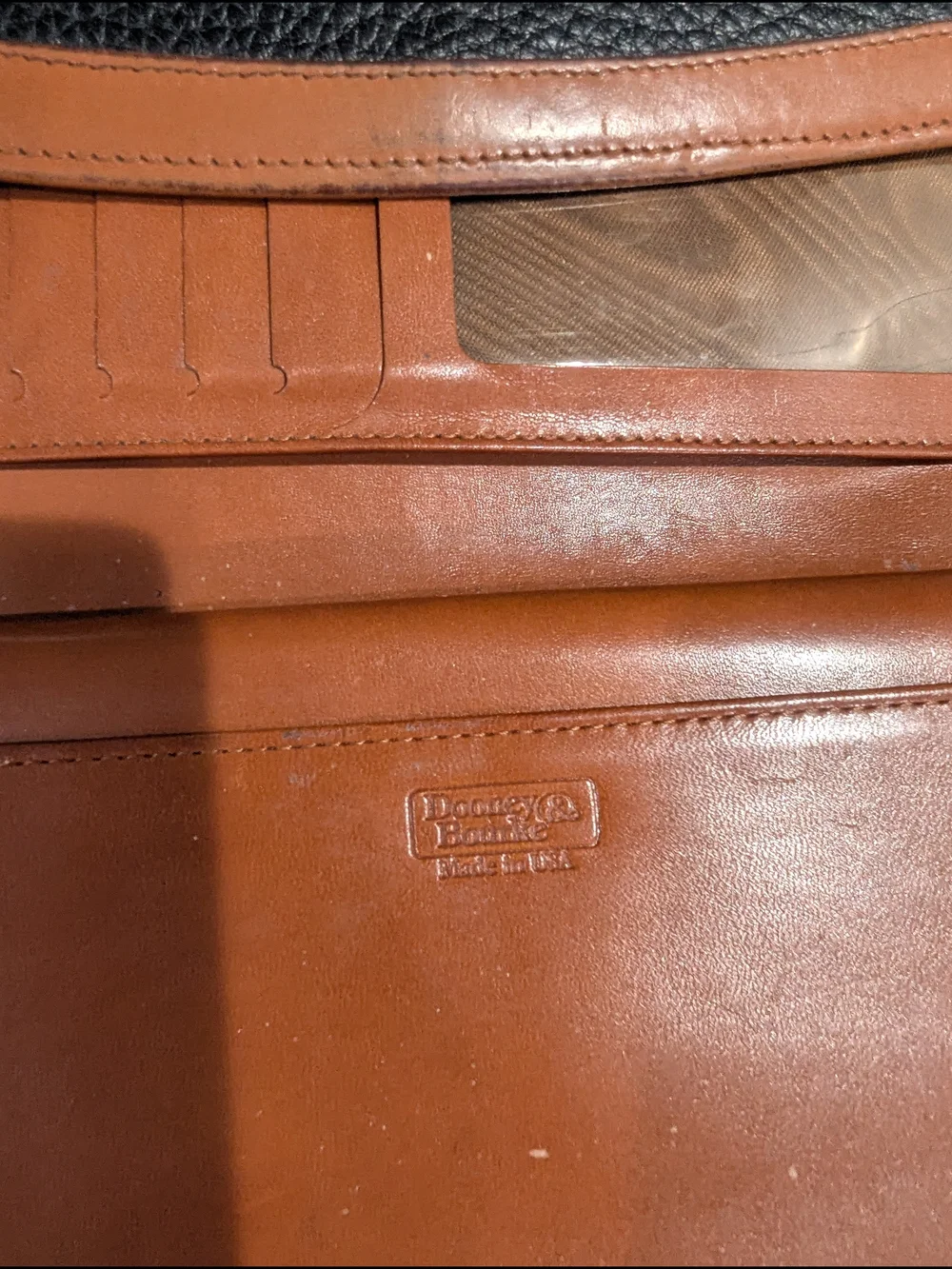 Dooney & Bourke Vintage Black/Tan Pebble Leather Organizer Wallet.  Size 7x3.5x1